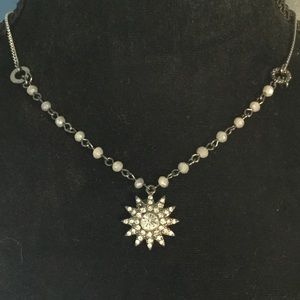 Pretty adjustable snowflake necklace with pearls.